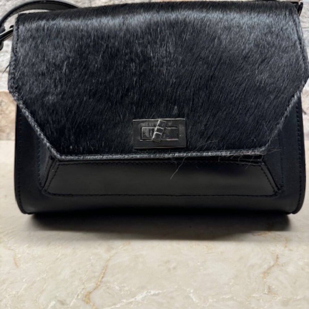 Black leather purse with cowhide front